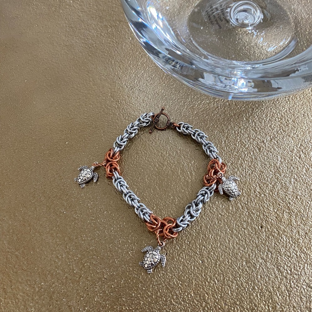 Silver and Copper toned Turtle Charm Bracelet